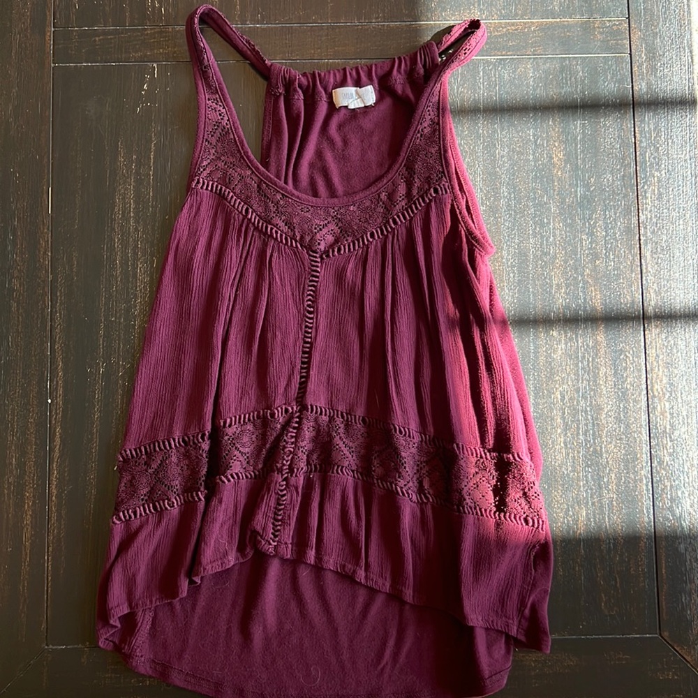 Maroon tank with cutout lace details on front